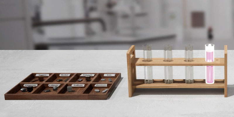 Metals reacting with water and acid in test tube.