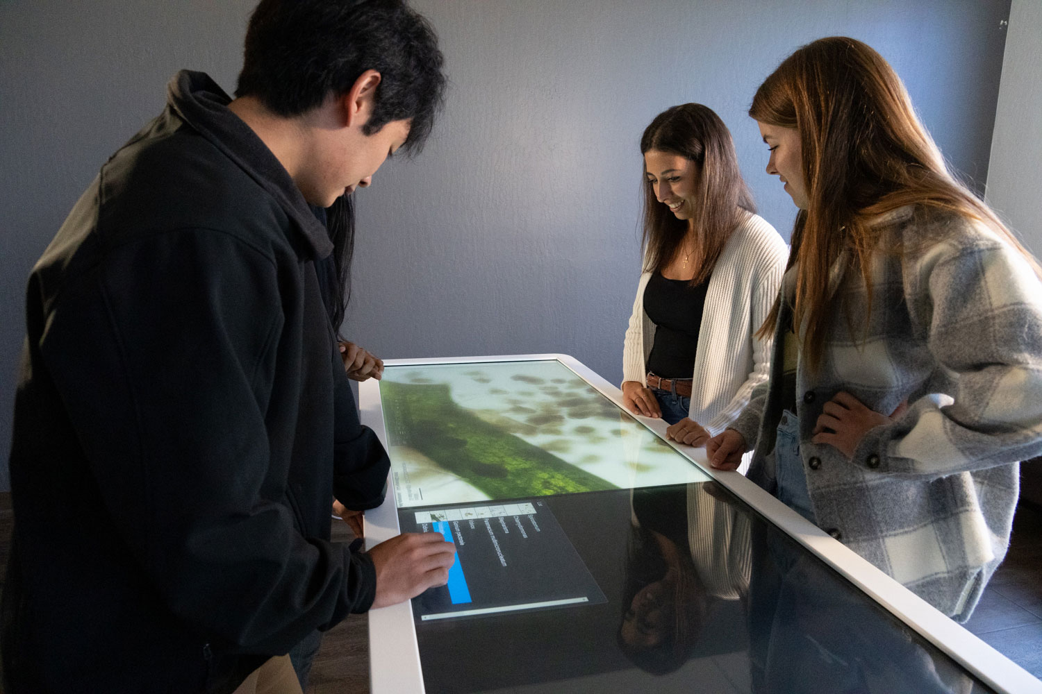 Students engaged in interactive science experiments using Anatomage’s virtual science technology, designed for enhanced STEM education.